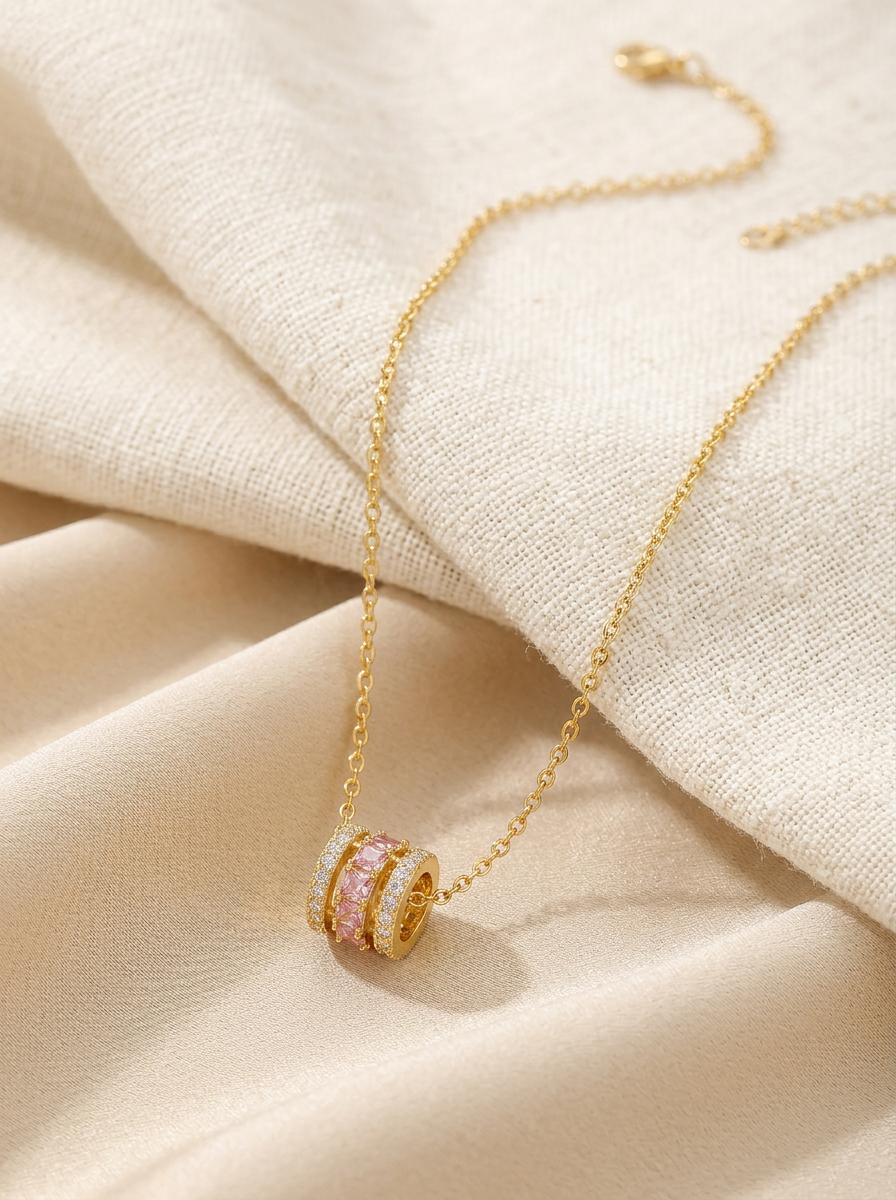 Collier Cylindre Cristaux Roses Doré